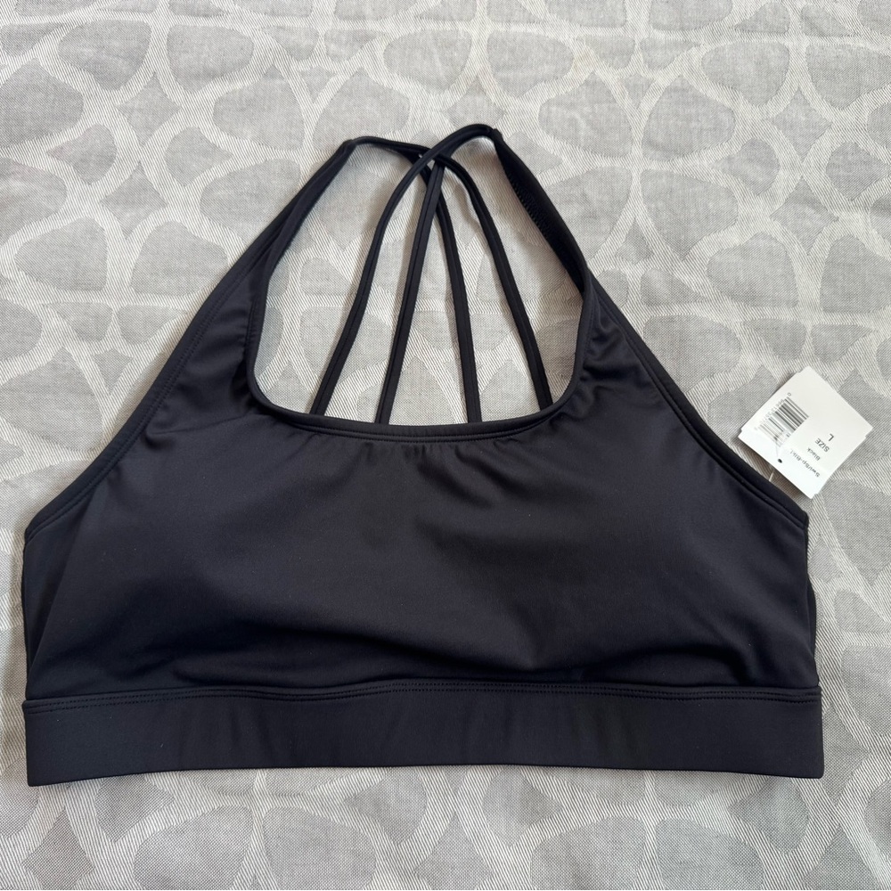 Humankind swim top in black